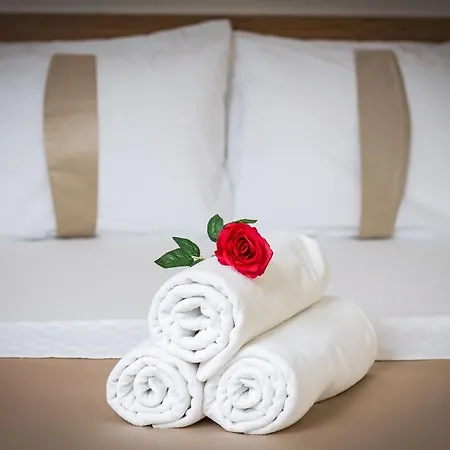 Zeyn Otel Istanbul Exterior photo Towels on a bed